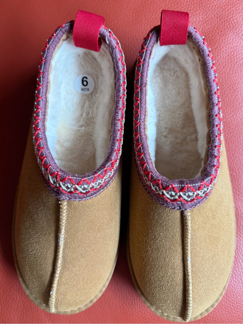 Women's Camel Suede Indoor Slip-On Slippers with Red Trim